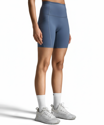 2XU Form Stash Hi-Rise Bike Short with white background and shadow