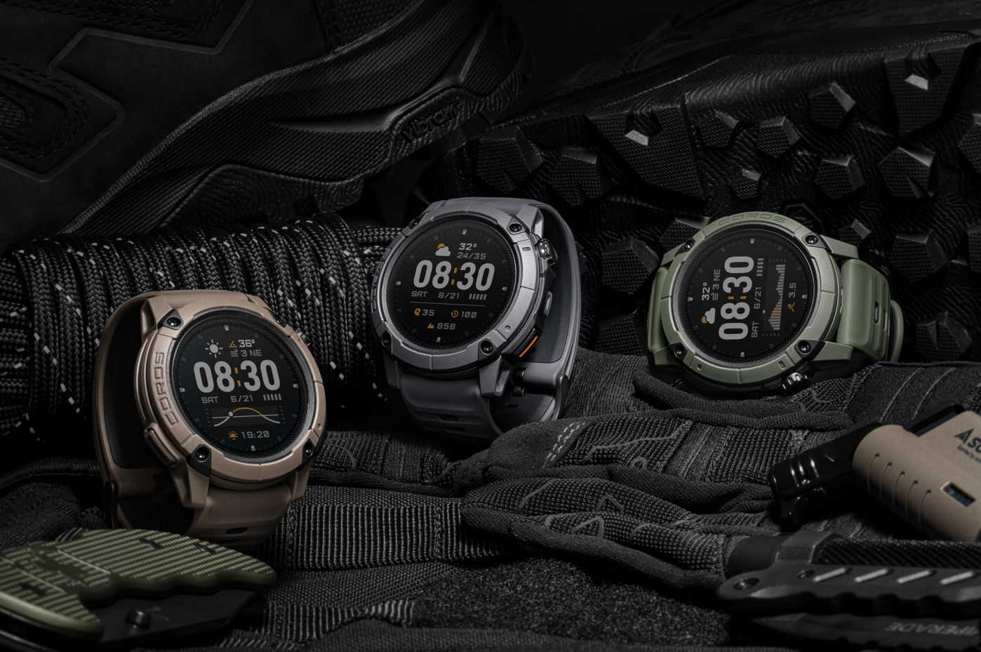 Three smartwatches on a tactical background with gloves and gear.