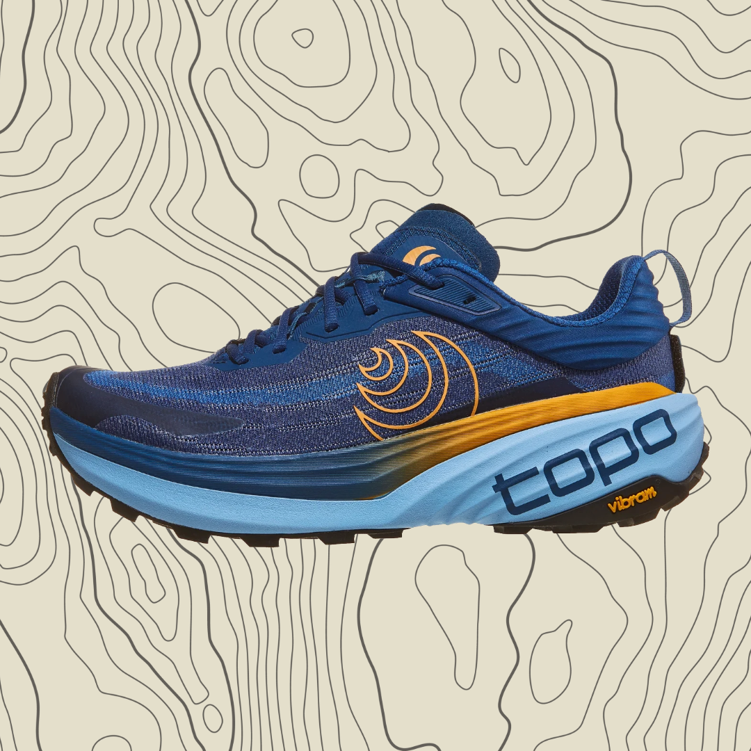 Blue running shoe with orange accents on a topographic background