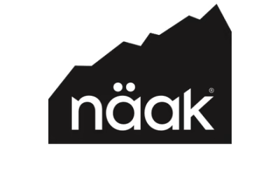 White logo of the brand 'näak' on a black mountain background